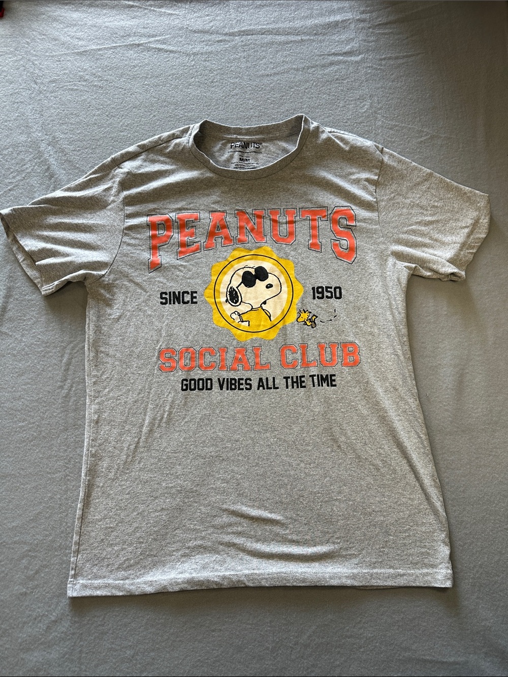 Peanuts Gray Tee with Orange Lettering & Yellow Snoopy Emblem